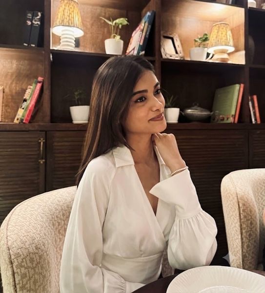 Aarya Lavale seated in a study, turned towards the light